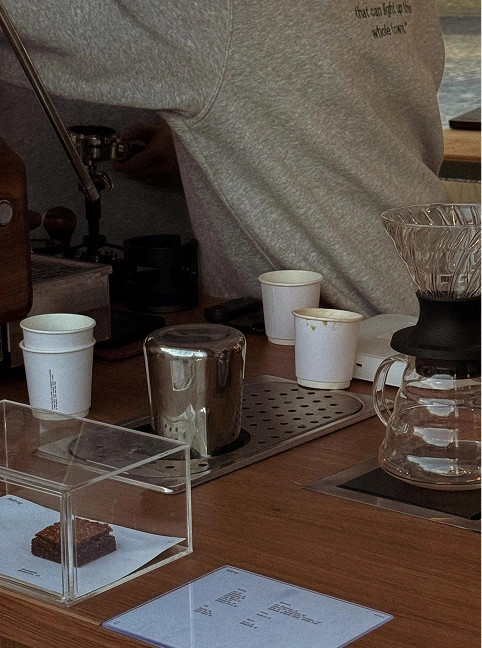 Pour-over coffee being served at the bar